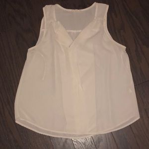 White sleeveless blouse